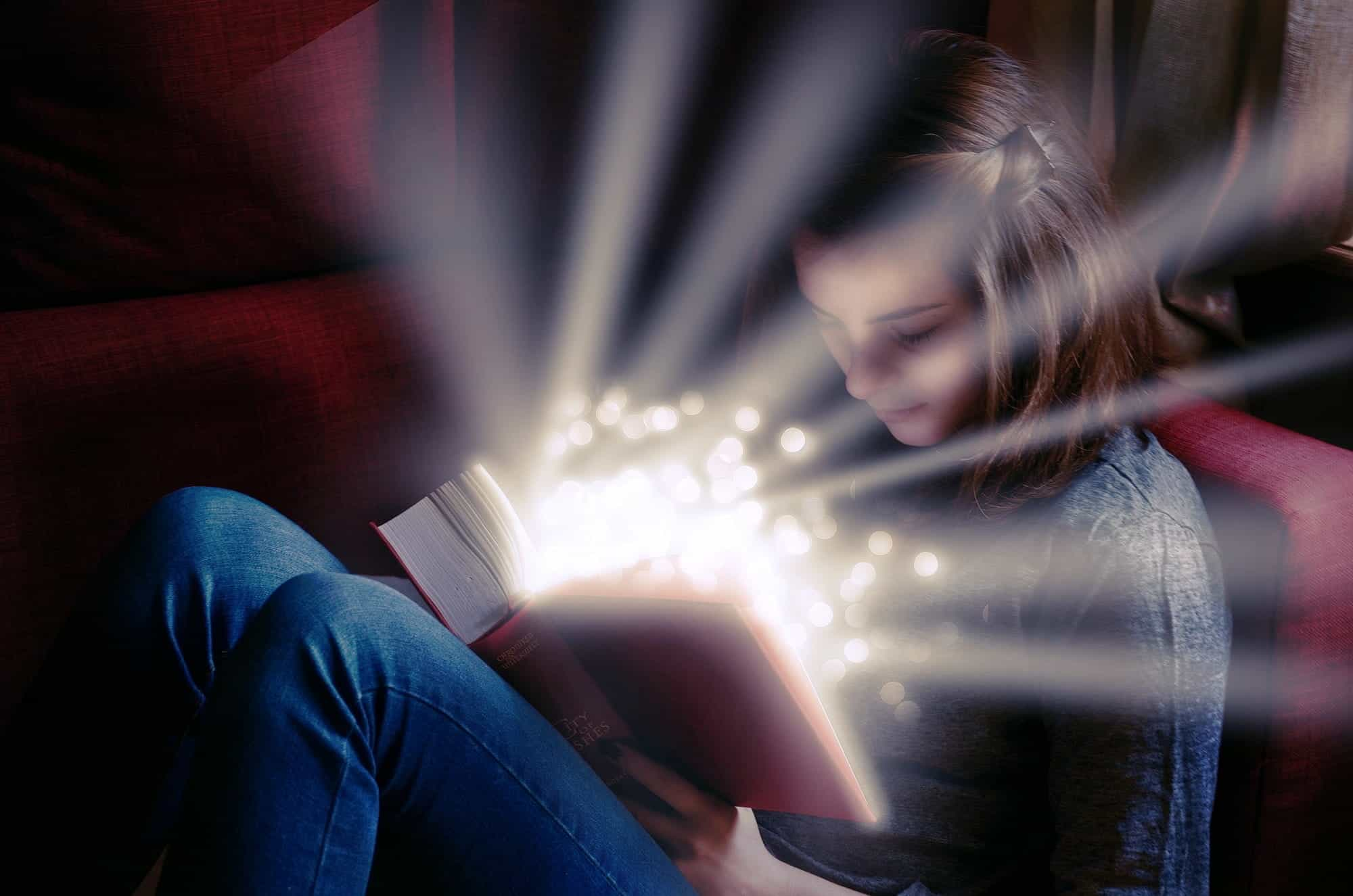 A young girl reading a fairy tale.