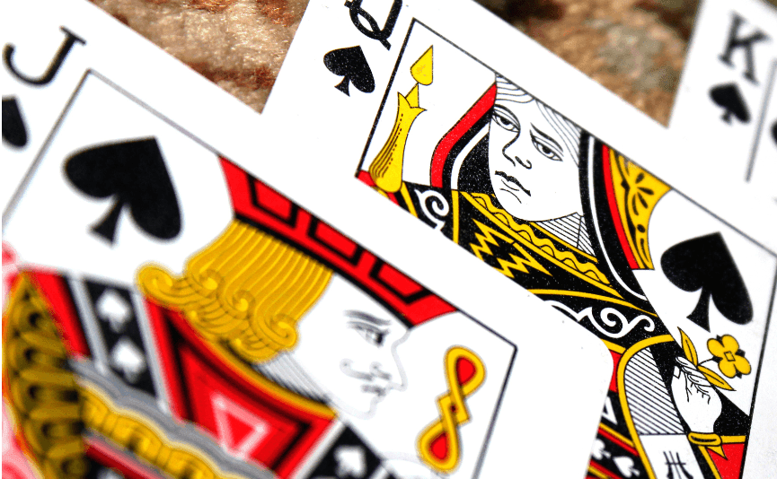 Jack Queen King of spades playing cards.