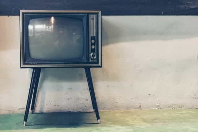 A retro television on legs.