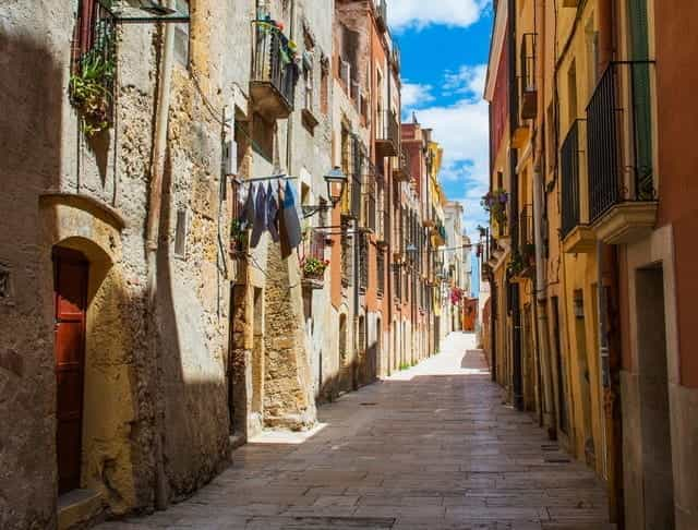 A sunny alley in Catalu?a, Tarragona, Spain.