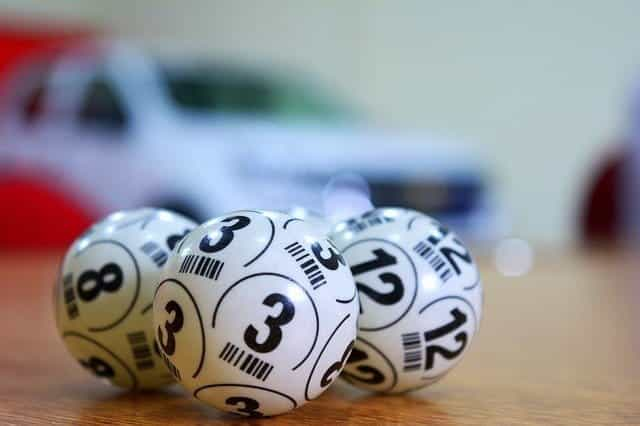 Three numbered lottery balls.