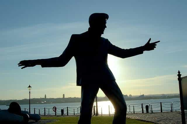 A silhouette of a sculpture of Elvis Presley.