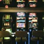 A row of slot machines in a casino.