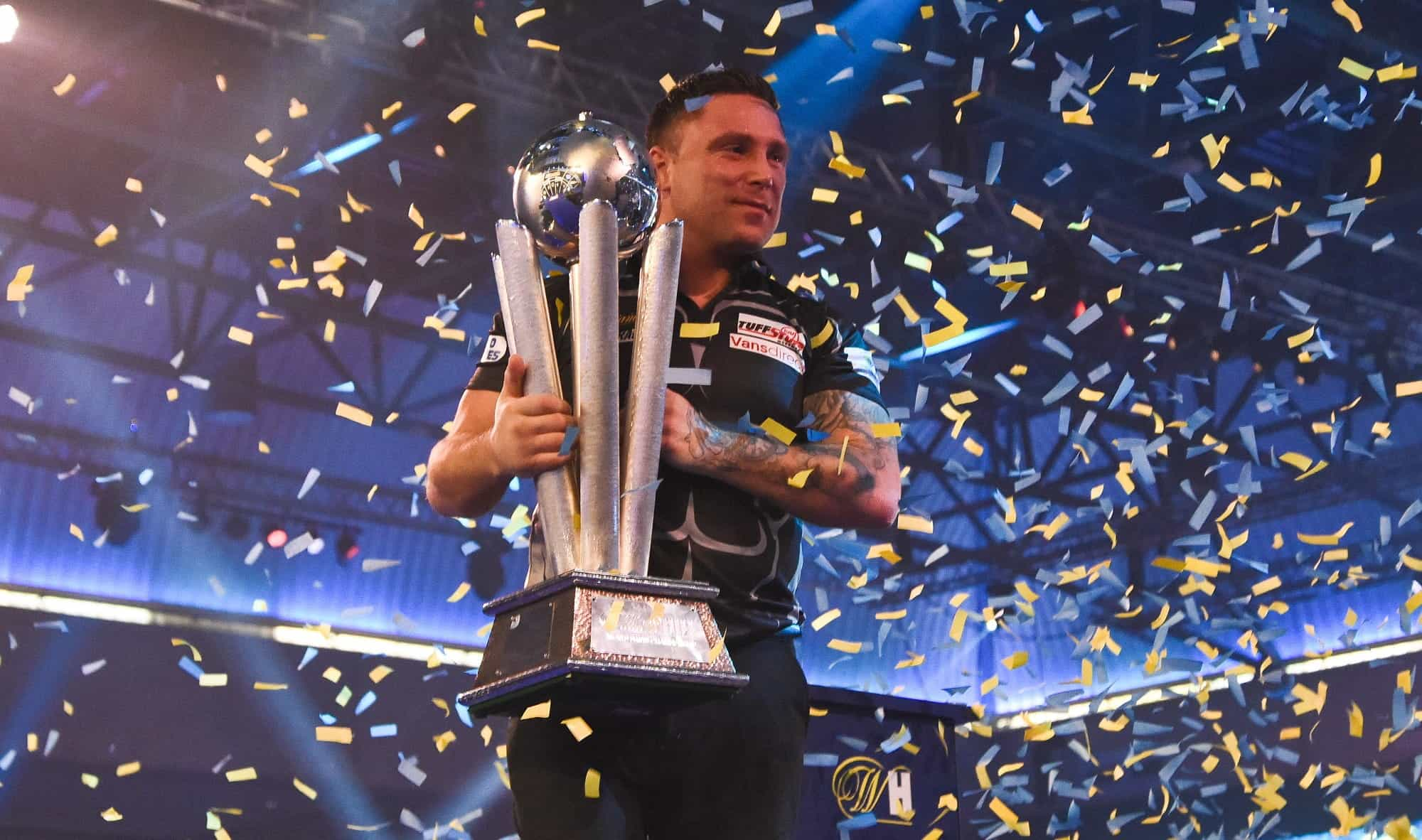 Gerwyn Price with the world championship trophy.