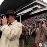 Racegoers watch the action at Cheltenham