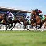 Jim Crowley riding Minzaal to victory at Newbury.