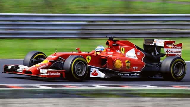 Ferrari driving in Formula One race.