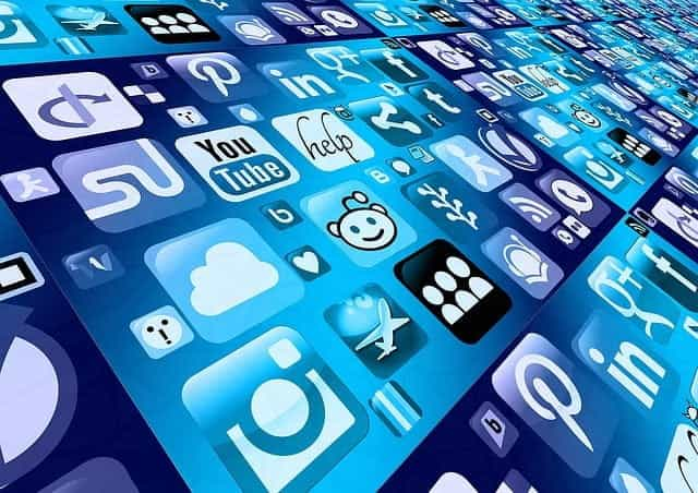 A sea of different digital media and social media platform icons on a vast blue background.