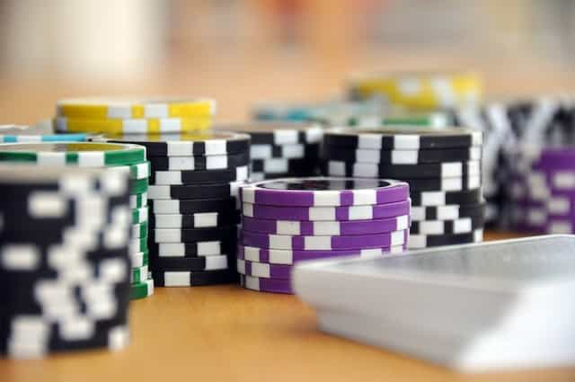 Poker chips and playing cards.