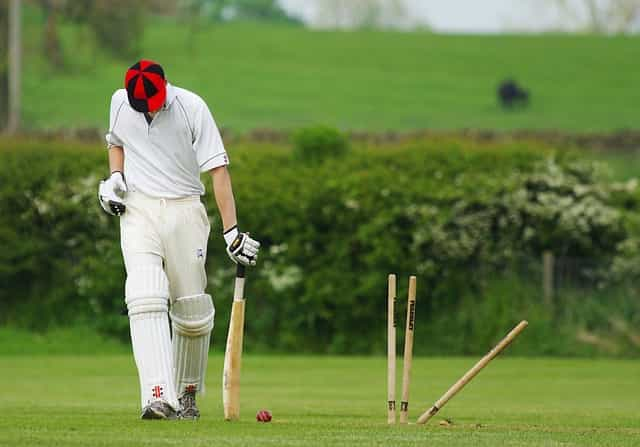 Man at bat in cricket.