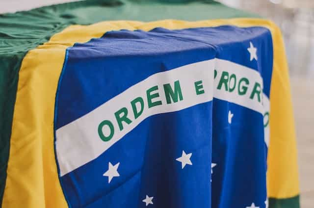 The Brazilian flag draped over a table.