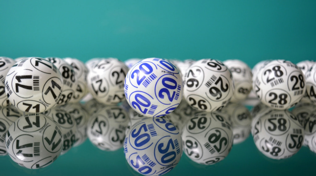 Lottery balls put on a flat glass surface